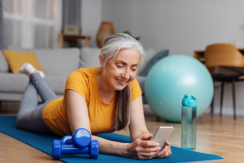 senior-woman-resting-yoga-mat